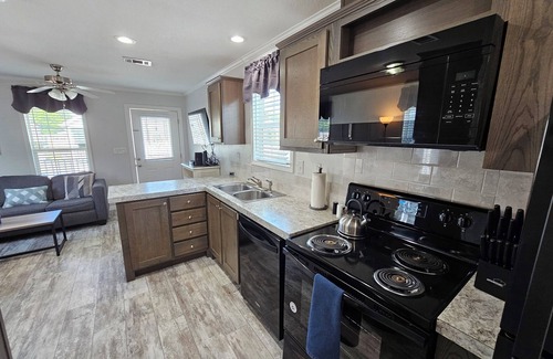 Kissimmee Casa | 1 BEDROOM DISNEY AREA RENTAL WITH GOLF CART AWARD WINNING "MILL CREEK RESORT"