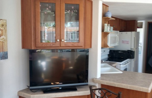 Kissimmee Complejo | SPACIOUS 1 BEDROOM LOFT GOLF CART IN DISNEY AREA 5 STAR RATED MILL CREEK RESORT