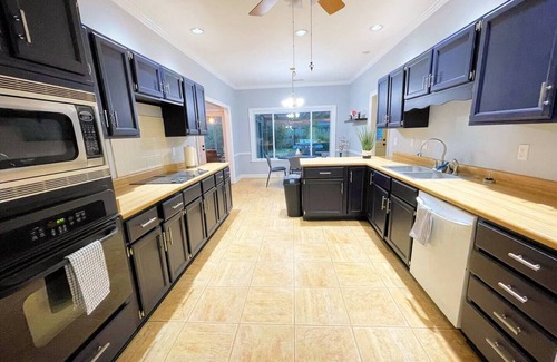 Ellendale Casa | Spacious 4-Bedroom Retreat with Game Room and Backyard BBQ