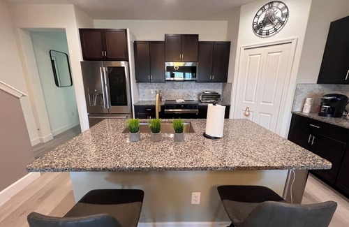 Palm River-Clair Mel Casa | Spacious 4-bedroom townhome with WiFi, AC in charming Tampa