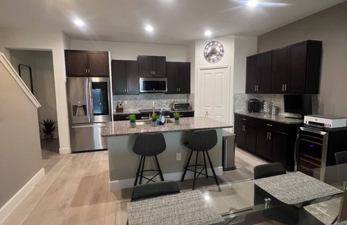 Palm River-Clair Mel Casa | Spacious 4-bedroom townhome with WiFi, AC in charming Tampa