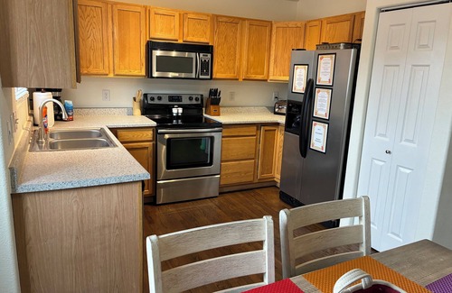 Fountain Casa | Spacious 4BR/3BA Home for 12,Private Outdoor Movie,Fast Wifi & Equipped Kitchen!