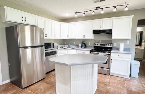 East Central Shelby Casa | Spacious 4BR Retreat with BBQ, Hammock, and Outdoor Lounge