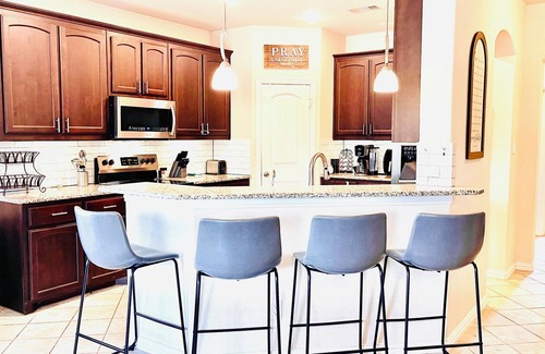 Ennis Casa | Spacious 5 Bedroom Home, Huge Swim Spa & Private Theater with Popcorn Machine!