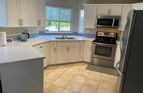 Langley Casa | Spacious 5-bedroom home with parking