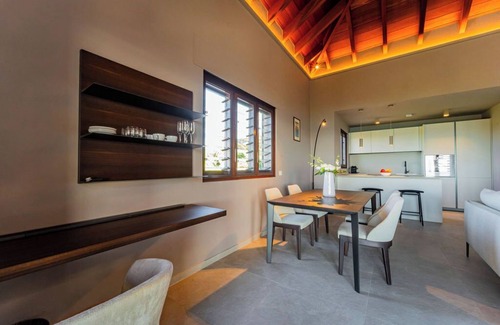 Jolly Harbour Casa | Spacious 6 bedroom hillside villa w/ infinity pool, gym, and stunning views.