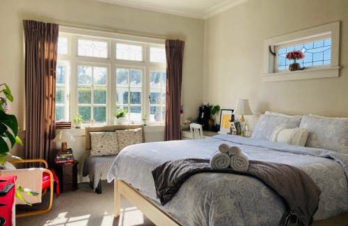 Mount Albert Casa | Spacious and Sunny Master Bedroom with shared bathrooms