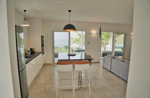 Anse Marcel Apartamento | Cosy spacious appartment facing the sea with private garden