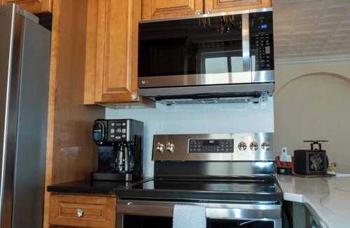 Edgerton Condominio | Spacious Condo: Historic Boutique Rental in Downtown Edgerton