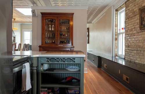 Edgerton Condominio | Spacious Condo: Historic Boutique Rental in Downtown Edgerton
