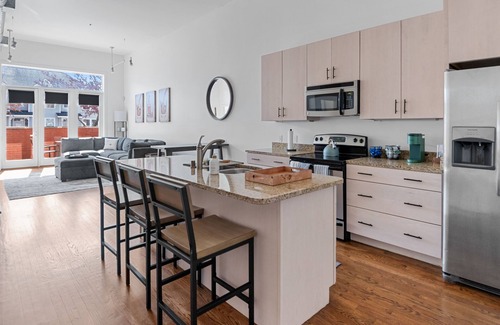 East Market District Condominio | Spacious Condo in Center of NULU with Free, Gated, Secure Parking and Entrance
