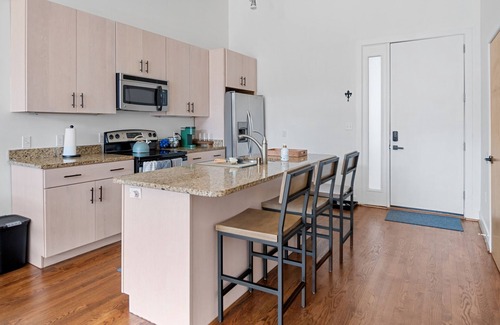 East Market District Condominio | Spacious Condo in Center of NULU with Free, Gated, Secure Parking and Entrance