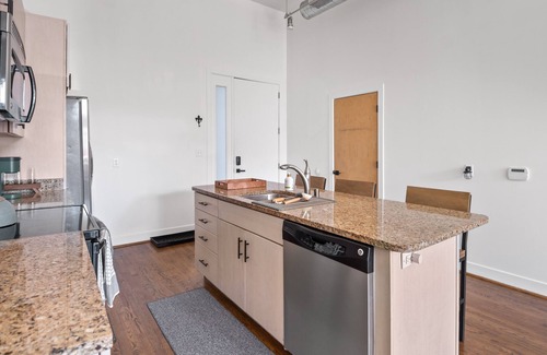 East Market District Condominio | Spacious Condo in Center of NULU with Free, Gated, Secure Parking and Entrance