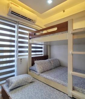 Ususan Apartamento | Spacious condo with pool view at Grace Residences, near BGC