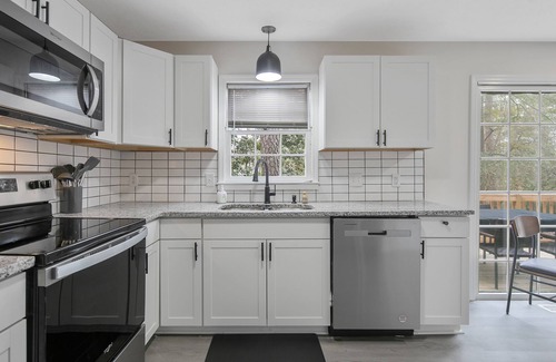 Terry Sanford Casa | Spacious Family Oasis with Hot Tub, PingPong, Air Hockey & More - Ideal Getaway!
