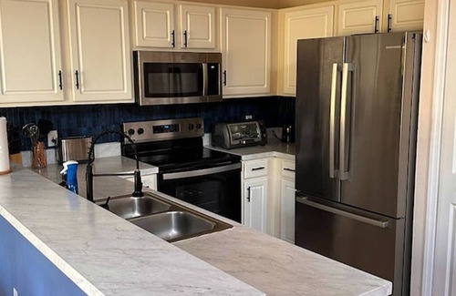 Windwood Bay Casa | Spacious Family Vacation Retreat. 3 BDR House. Pool, 15 Min to Disney and Parks.