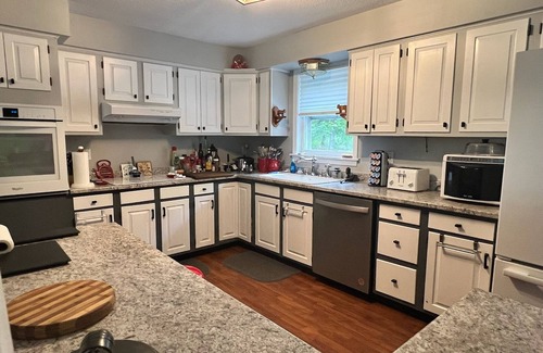 Pittsburg Casa | Spacious five-bedroom home off Back Lake with direct trail access on Spooner Rd