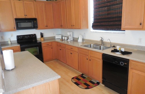 Kissimmee Casa | Amplia casa completamente amueblada con piscina climatizada y spa, a 25 minutos de Disney y Universal