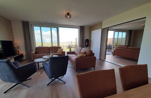Leons Casa | Hermosa villa en el agua de Frisia con un balandro (de pago)