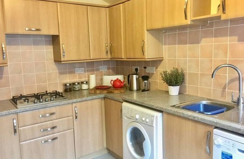 Sheringham Apartamento | Amplia casa de Norfolk, a pocos minutos de la playa y tiendas con estacionamiento privado
