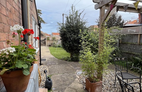 Sheringham Apartamento | Amplia casa de Norfolk, a pocos minutos de la playa y tiendas con estacionamiento privado