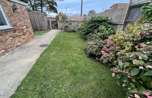 Sheringham Apartamento | Amplia casa de Norfolk, a pocos minutos de la playa y tiendas con estacionamiento privado