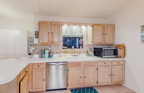 Port Malabar Casa | Spacious home near the Ocean overloooking the Preserve with enclosed Patio & W/D