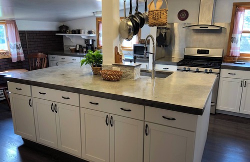Calumet Casa | Spacious home with charming lodge feel – In town, one block from trails!