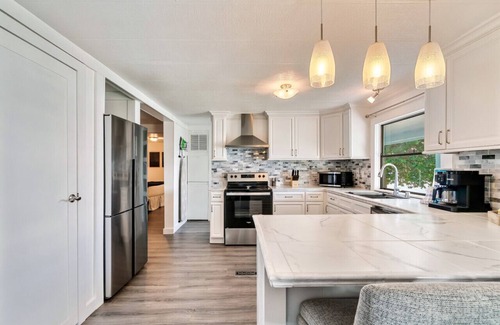 Dandridge Casa | Spacious Lakefront Home: New Private Boat Dock, Boat Ramp, Hot Tub, Game Room