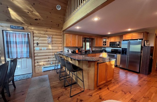 East Wakefield Casa | Spacious Lakefront Log Home for Family Fun & Relaxation- deck, firepit, gameroom