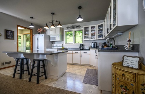 Bigfork Casa | Spacious Large Friendly Home w/5 King Beds, Hot Tub, Firepit, Lake Views