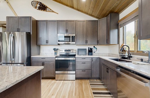 Sunday River Area Casa | Spacious mountain retreat with fire pit, hot tub, sauna, and foosball