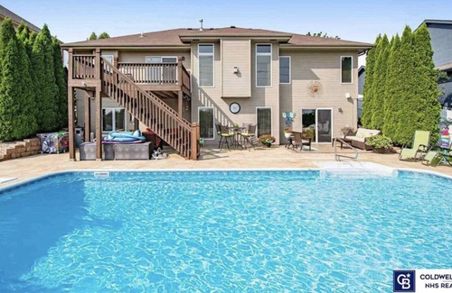 Omaha Casa | Spacious pool house with tons of amenities, your perfect family vacation spot!