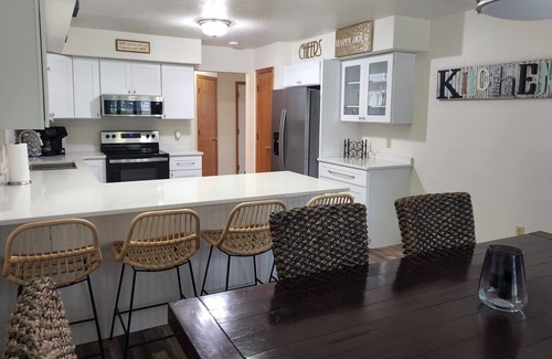 Tomah Casa | Spacious Townhome in quiet neighborhood with firepit!