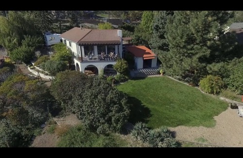 Okanagan-Similkameen Casa | Spanish Mid Century Villa with Wood Barrel Sauna