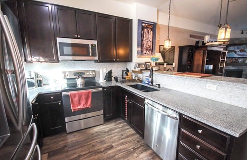 Longmont Casa | SpeakEasy Suite, relax in classic luxury with private living space and bedroom