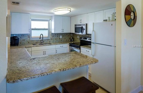 Sand Key Condominio | Espectacular frente al golfo totalmente renovado 2B / 2B en Sand Key, Clearwater Beach, FL