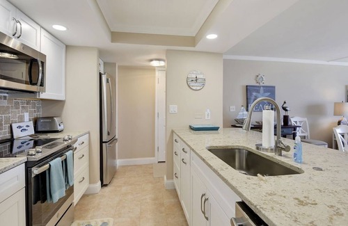 East Wind South Condominio | Condominio frente al mar * WiFi gratuito y estacionamiento * Piscina * Bicicletas * Cancha de tenis * Suministros de playa * AC