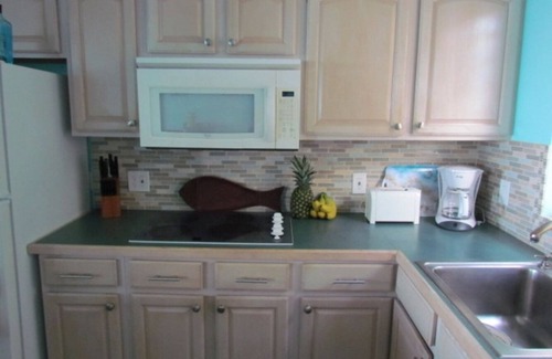 Cotton Valley Condominio | Spectacular Oceanview 2 Bedroom Coakley Bay Condo with AC & Wifi.