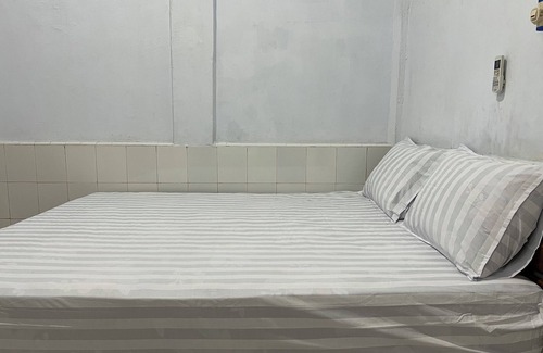 Makassar Hotel | SPOT ON 92654 Oma Homestay
