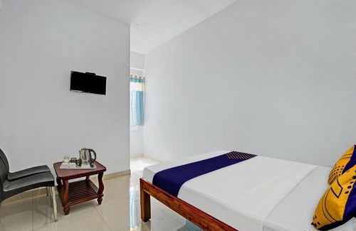 Bengaluru Hotel | SPOT ON Sri Sai Boarding And Lodging