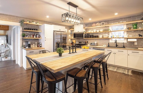 Cairo Otro | Spring Creek Farmhouse Luxury Family Retreat on 25 acre with direct river access