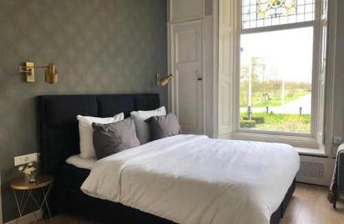 Hoogzand Casa | Statige boerderijwoning met vrij uitzicht en tuin