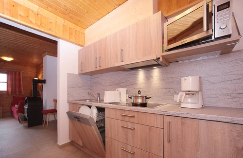 Hochkrimml Apartamento | Staudi's ski hut Top7 in hut style directly on the piste Wood-burning stove