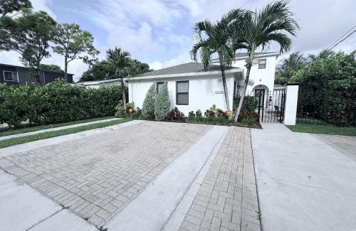 Coral Way Casa | Stay Central: Relax in Our Heated Pool Oasis