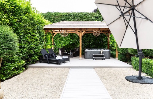 Painswick Cabaña | Stay in Luxury at The Stables at Court House Manor