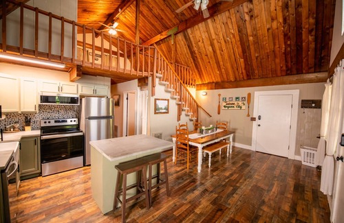 Cherokee Cabina | Stay in the Treehouse Lodge! Hot tub, game room, fire place, wrap around porch!