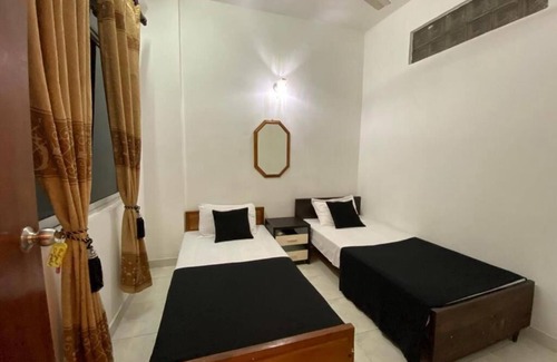 Pamankada West Apartamento | Stay Salty- City / Ocean and sunset view apartment