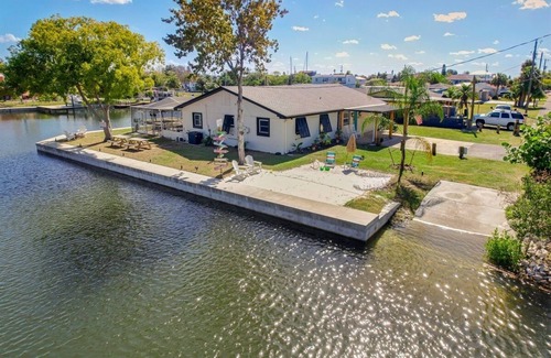 Sea Ranch Casa | "Stay Salty" Florida Pool/Canal Home, 4 bed, 3.5 bath, bring boat!