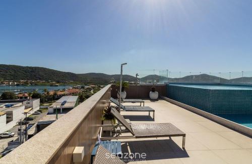 Passagem Apartamento | Estancia con piscina y sauna a pocos pasos de la playa en Cabo Frio - HSC